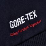 Palace X Gore-tex Going Further Black & Gold Varsity